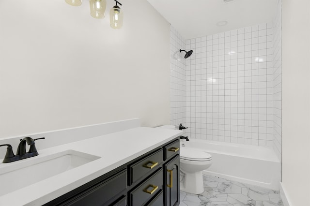 full bathroom featuring tiled shower / bath combo, tile flooring, toilet, and vanity