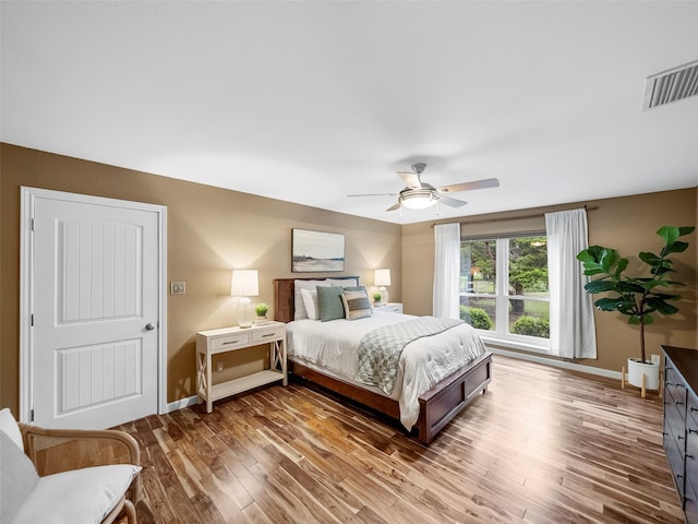 bedroom featuring ceiling fan and hardwood / wood-style floors