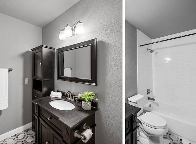 full bathroom with vanity, toilet, and tiled shower / bath