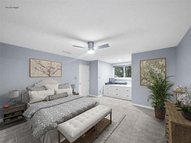 carpeted bedroom featuring ceiling fan