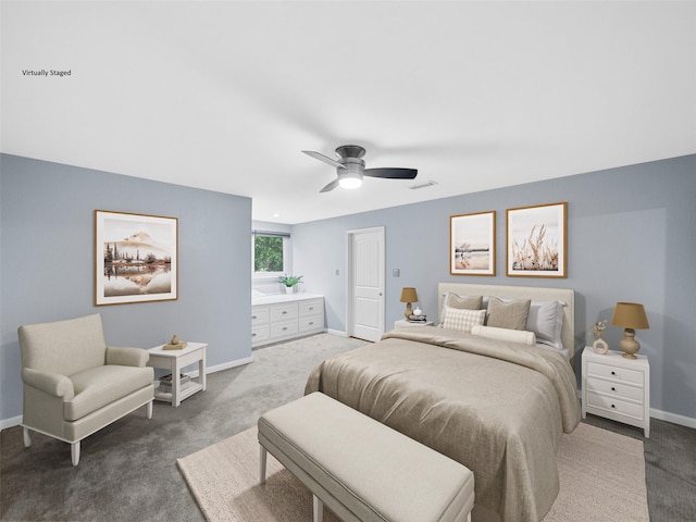 carpeted bedroom featuring ceiling fan