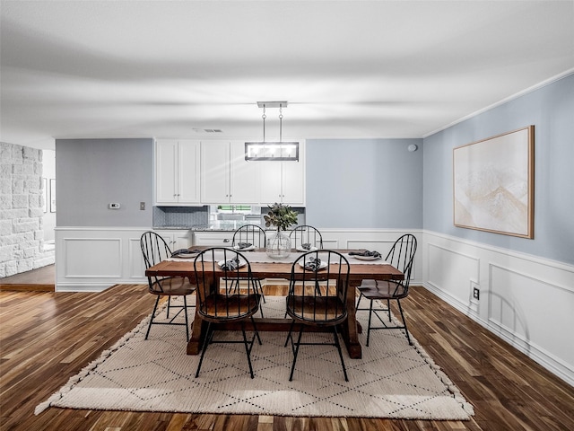 dining area featuring hardwood / wood-style floors