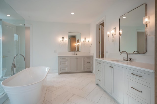 bathroom with a bathtub and vanity