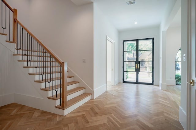 entryway featuring light parquet flooring