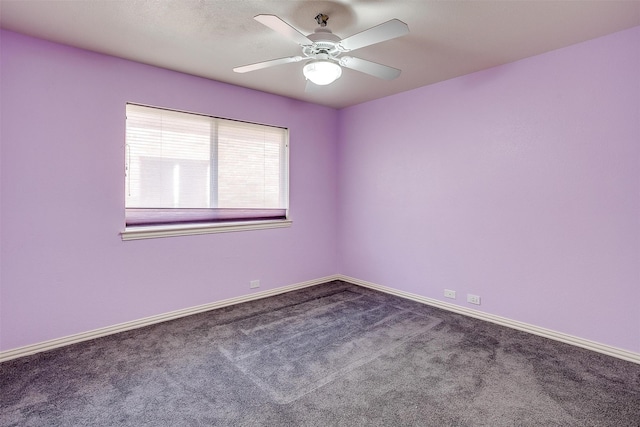 spare room with carpet flooring and ceiling fan