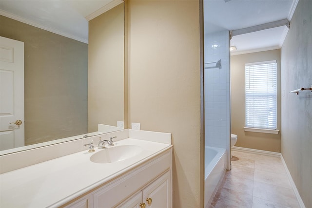 bathroom with toilet, vanity, tile patterned flooring, and crown molding