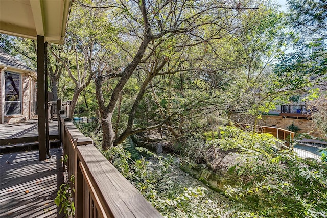 wooden balcony featuring a wooden deck