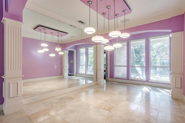 interior space featuring a tray ceiling, a healthy amount of sunlight, ornate columns, and crown molding