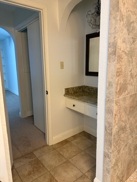 bathroom featuring tile patterned flooring