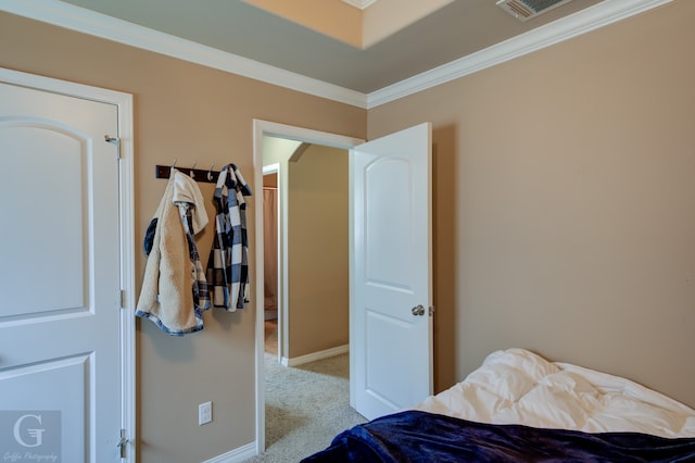 carpeted bedroom with crown molding