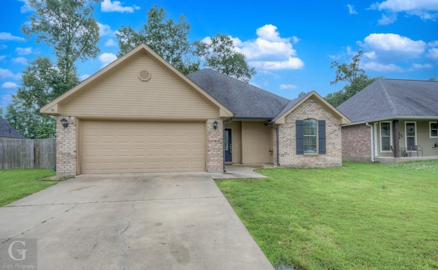 ranch-style home with a garage and a front lawn