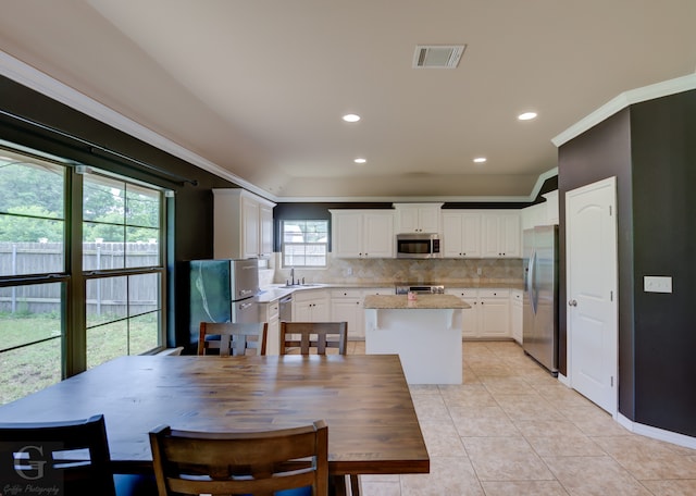 tiled dining space with sink