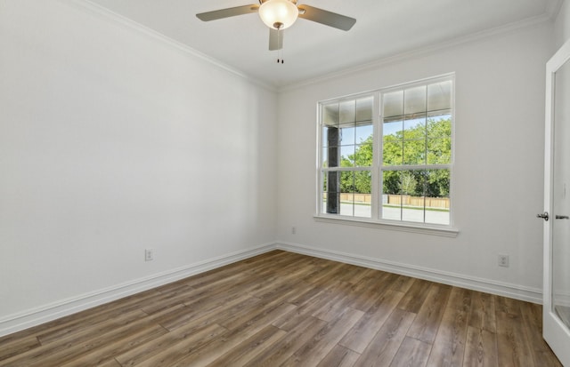 unfurnished room featuring ceiling fan, crown molding, and hardwood / wood-style floors