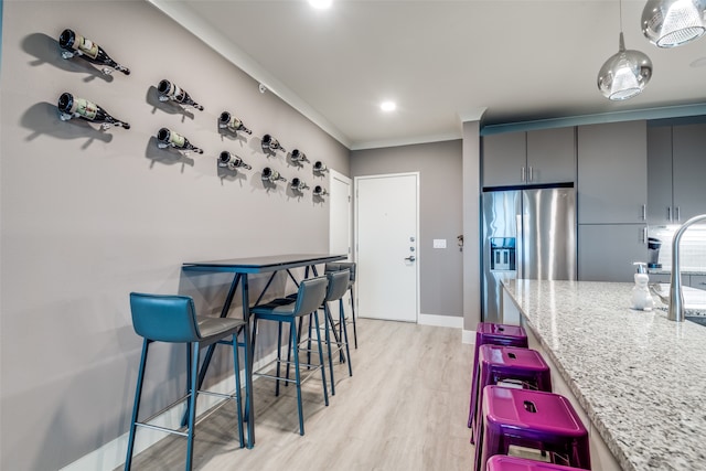 dining room with light hardwood / wood-style floors