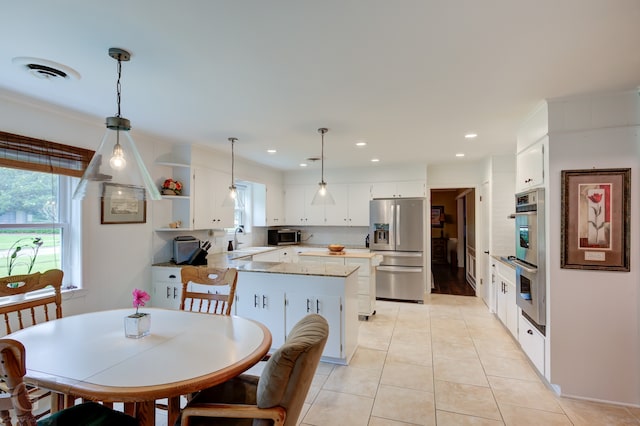 tiled dining space with sink