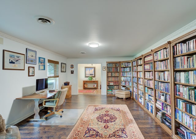 home office featuring crown molding and dark wood-type flooring