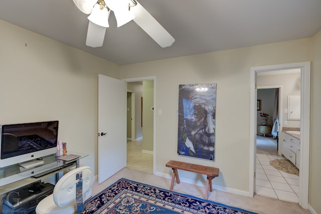 tiled bedroom with ceiling fan