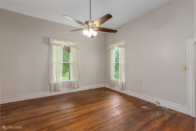 empty room featuring hardwood / wood-style floors, plenty of natural light, and ceiling fan