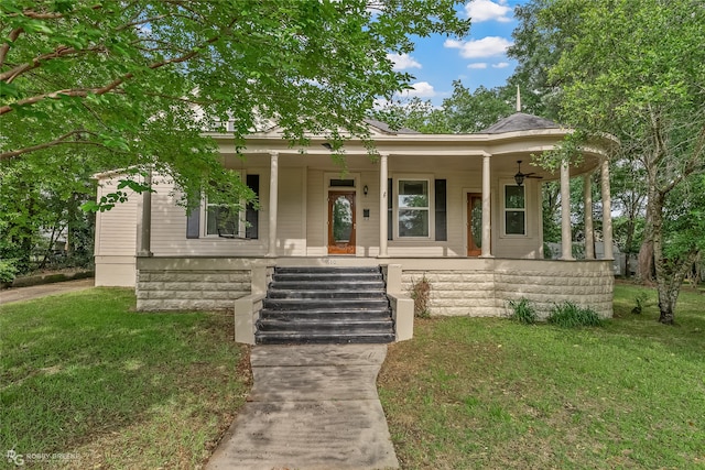 bungalow-style home with a porch and a front lawn