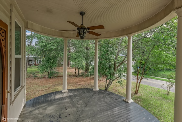 exterior space with ceiling fan and a patio