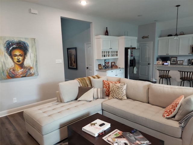 living room featuring dark wood-type flooring