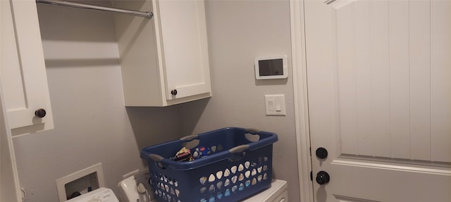 laundry area with cabinets and hookup for a washing machine