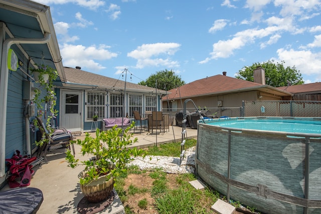 view of pool with a patio area