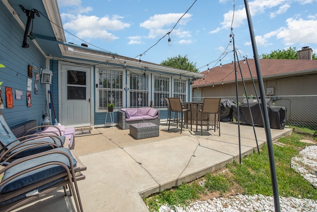 view of patio featuring an outdoor living space and grilling area