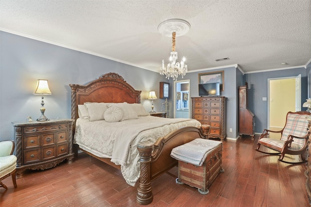 bedroom featuring wood-type flooring, ornamental molding, a textured ceiling, and a chandelier