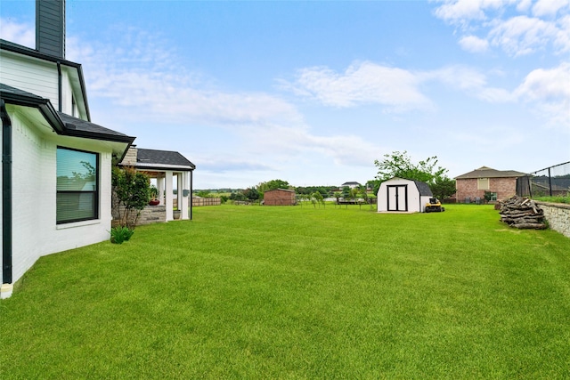 view of yard with a storage shed