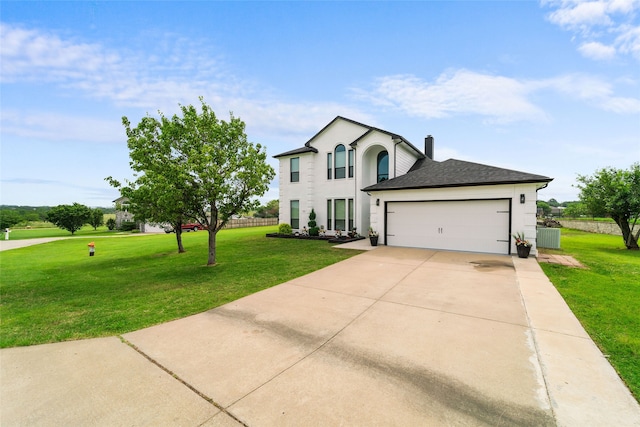 view of front facade featuring a front lawn and a garage