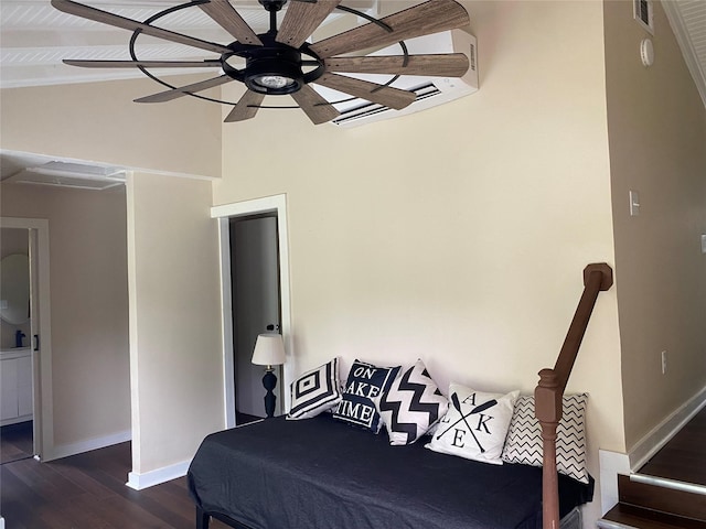 bedroom featuring dark hardwood / wood-style floors, beam ceiling, and ceiling fan