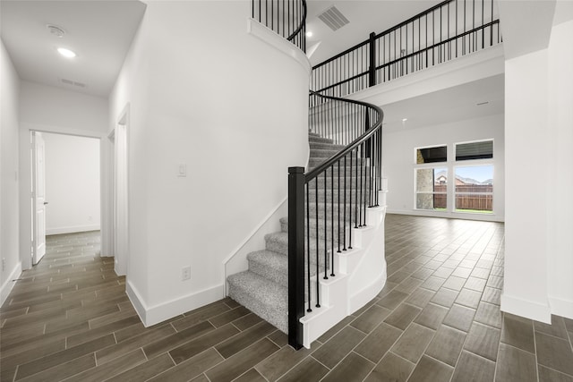 stairway with a high ceiling