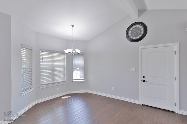 spare room with dark wood-type flooring, vaulted ceiling with beams, and an inviting chandelier