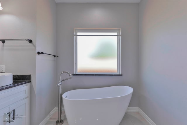 bathroom with tile flooring and vanity