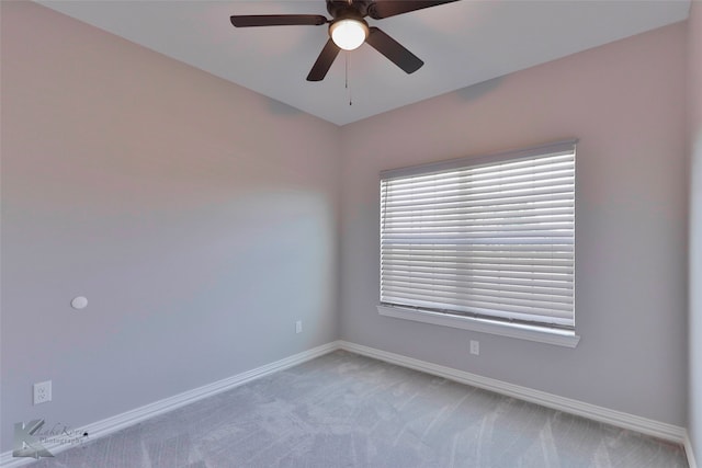 unfurnished room featuring carpet flooring and ceiling fan