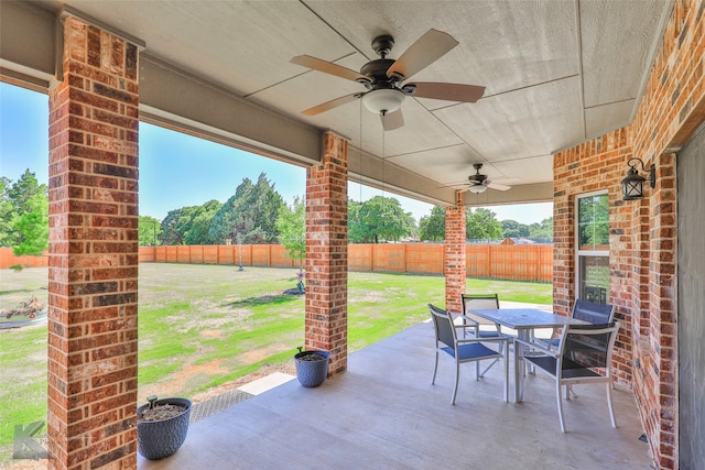 view of patio / terrace featuring ceiling fan