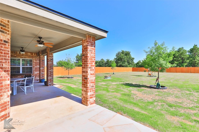 view of patio / terrace featuring ceiling fan