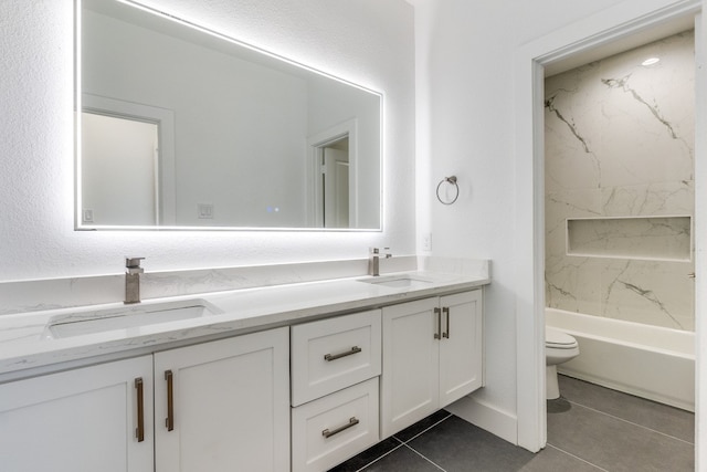 full bathroom with toilet, tub / shower combination, vanity, and tile patterned flooring