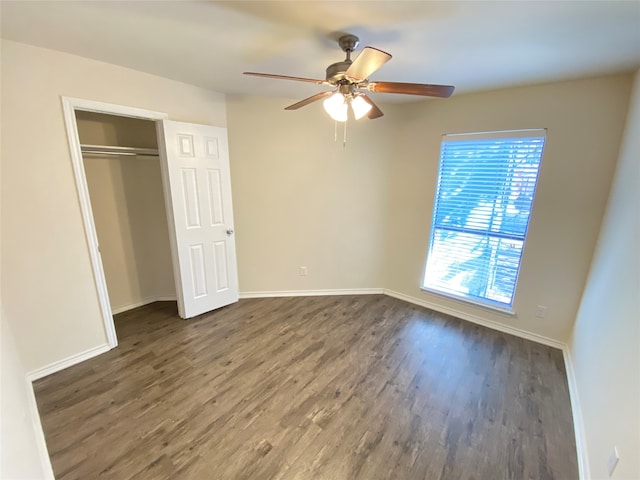 unfurnished bedroom featuring a closet, ceiling fan, and hardwood / wood-style floors