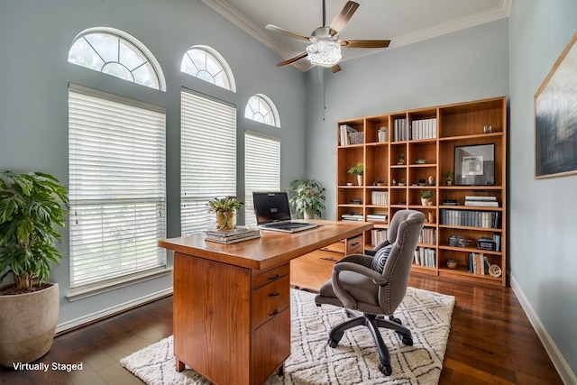 office space featuring ceiling fan, ornamental molding, and dark hardwood / wood-style flooring