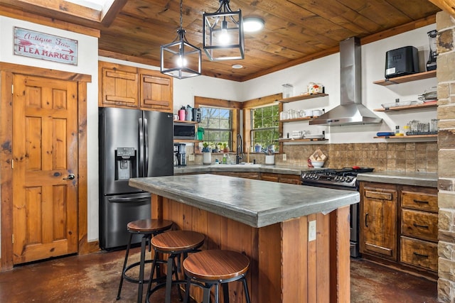 kitchen with island range hood, black gas stove, wood ceiling, and stainless steel refrigerator with ice dispenser