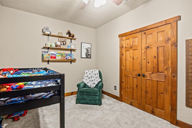 bedroom with ceiling fan and carpet floors