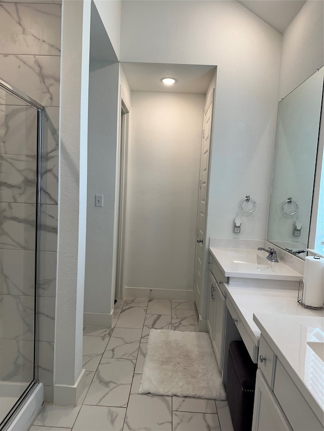 bathroom with tile floors, a shower with door, and vanity