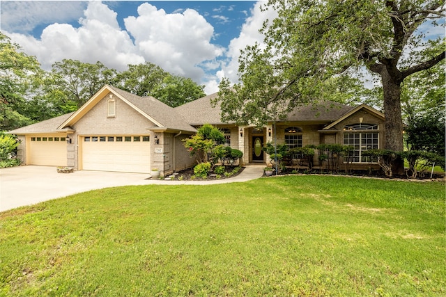 ranch-style house with a garage and a front yard