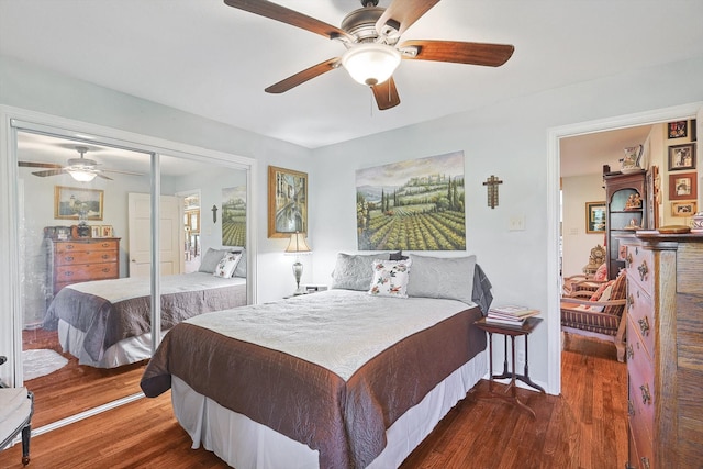 bedroom featuring ceiling fan, a closet, and dark hardwood / wood-style floors