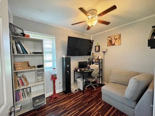 home office featuring crown molding, ceiling fan, and dark wood-type flooring