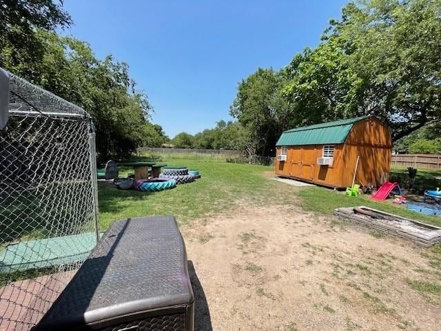 view of yard with a storage shed