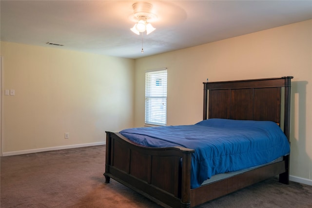 bedroom with carpet flooring, visible vents, baseboards, and ceiling fan