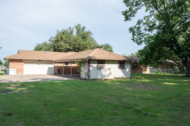 ranch-style house featuring fence, an attached garage, a chimney, a front lawn, and concrete driveway